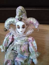 Stara porcelanowa lalka arlekin
