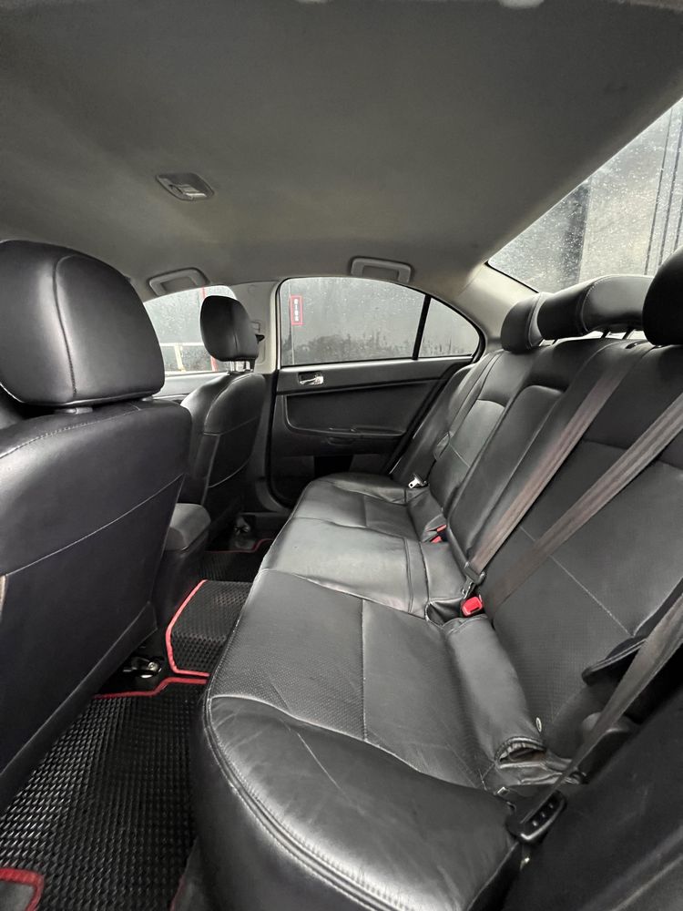 Mitsubishi Lancer 2012 • 1.6 МКПП ГАЗ/БЕНЗИН