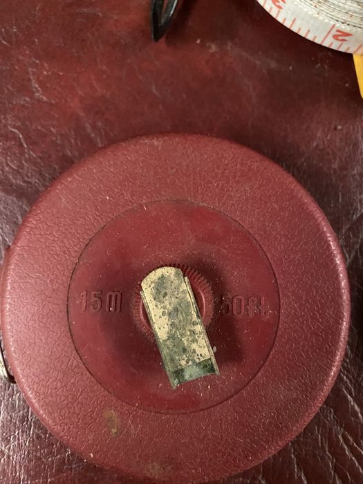 Fitas metricas em rolo e colete para ferramentas