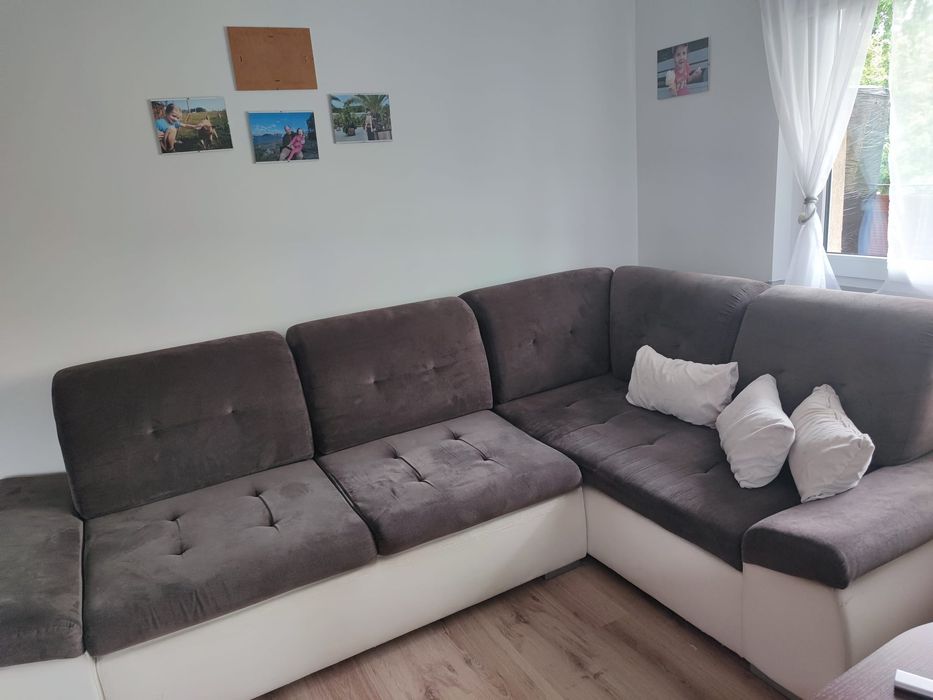 Narożnik z funkcją spania i pojemnikiem na pościel