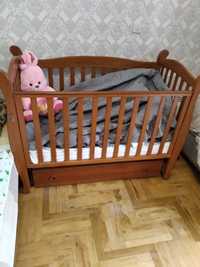 Детская кроватк-качалка