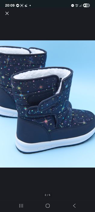 Продам зимові чоботи