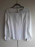 Blusa branca com detalhe no peito da Tiffosi