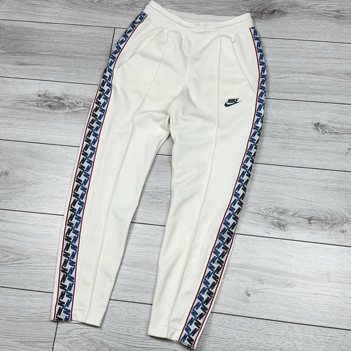 Спортивные штаны Nike Taped Pants спортивні штани найк теч фліс tech