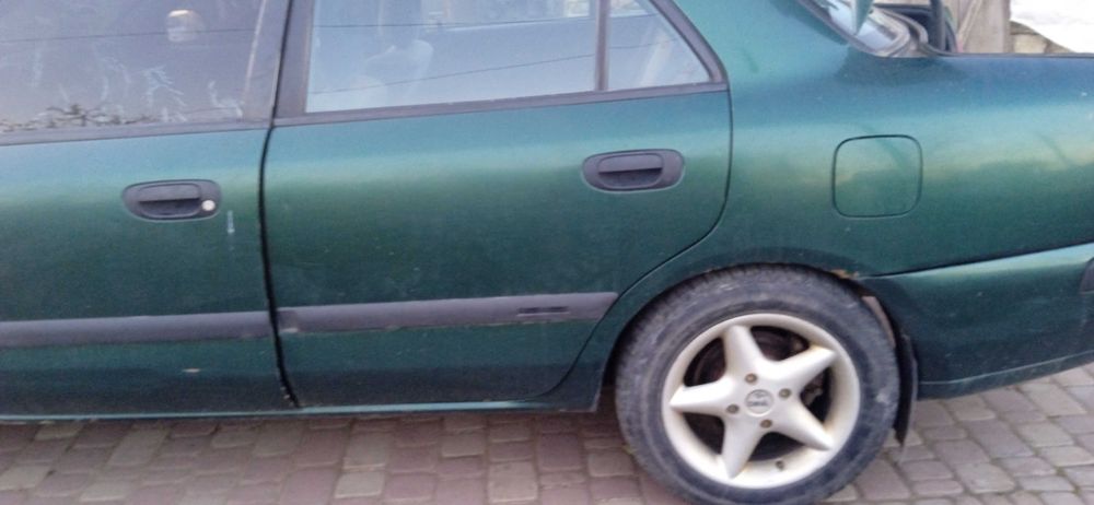 Двери  Mitsubish Carisma,хачбек седан Space Star F9Q 1.9