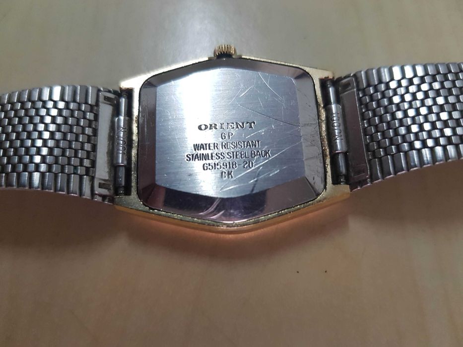 Zegarek nareczny ORIENT Quartz GP sprawny kolor zloty i czarny