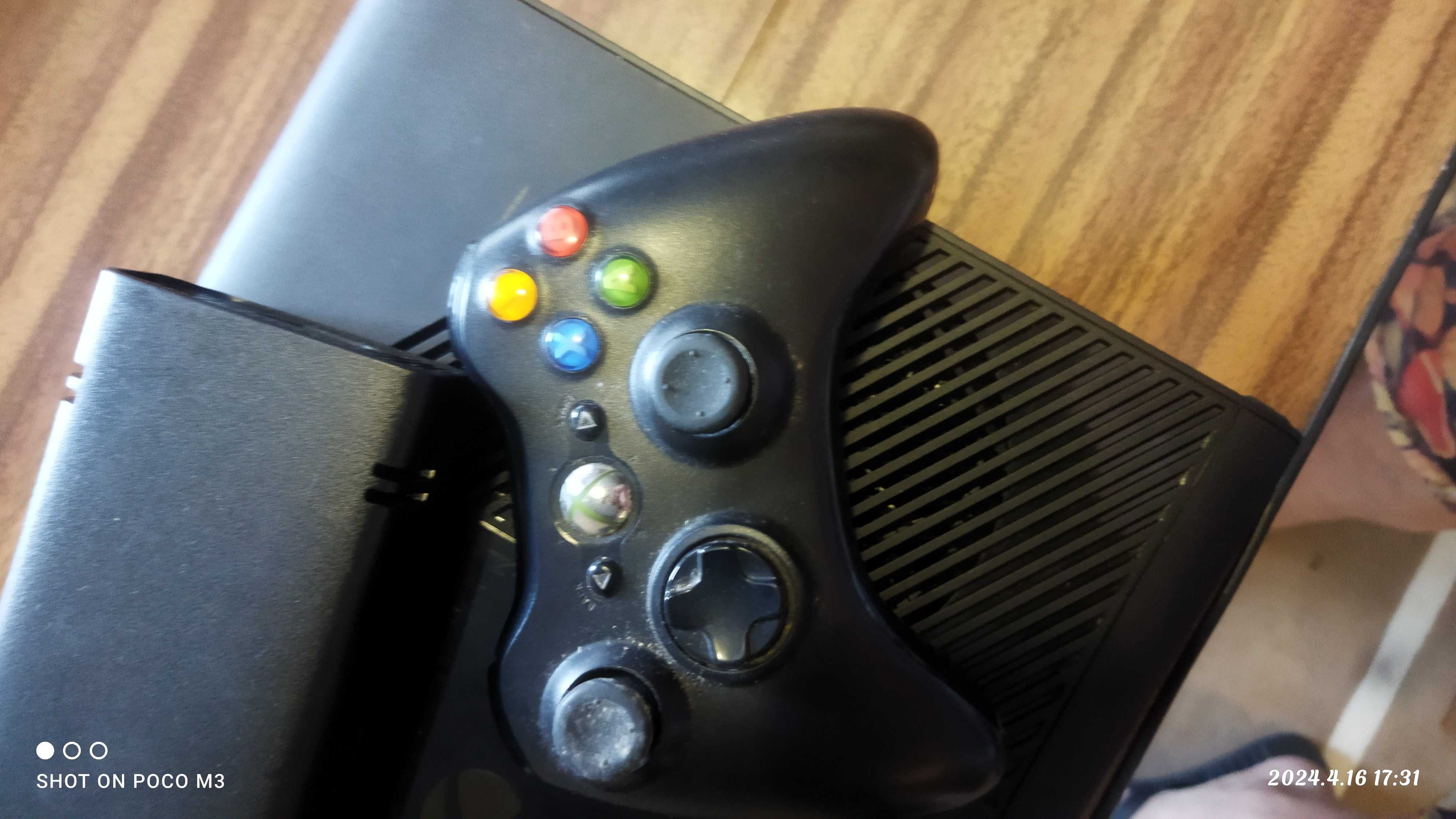 Xbox com jogos comando e cabos
