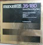 Oryginalna szpula 26.5 cm Maxell z org.  taśmą LOW NOISE.