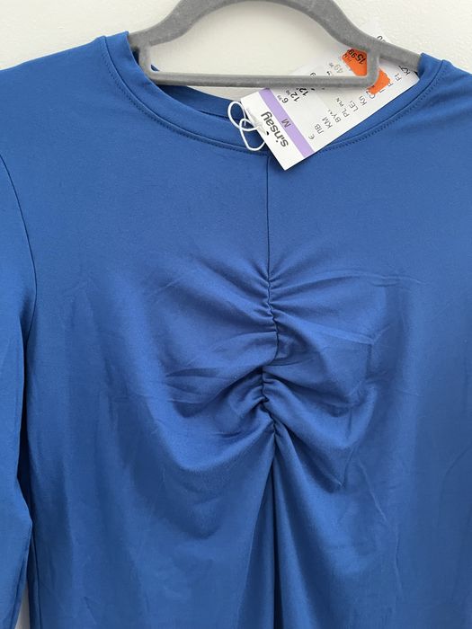 nowa niebieska krótka sukienka z długim rękawem