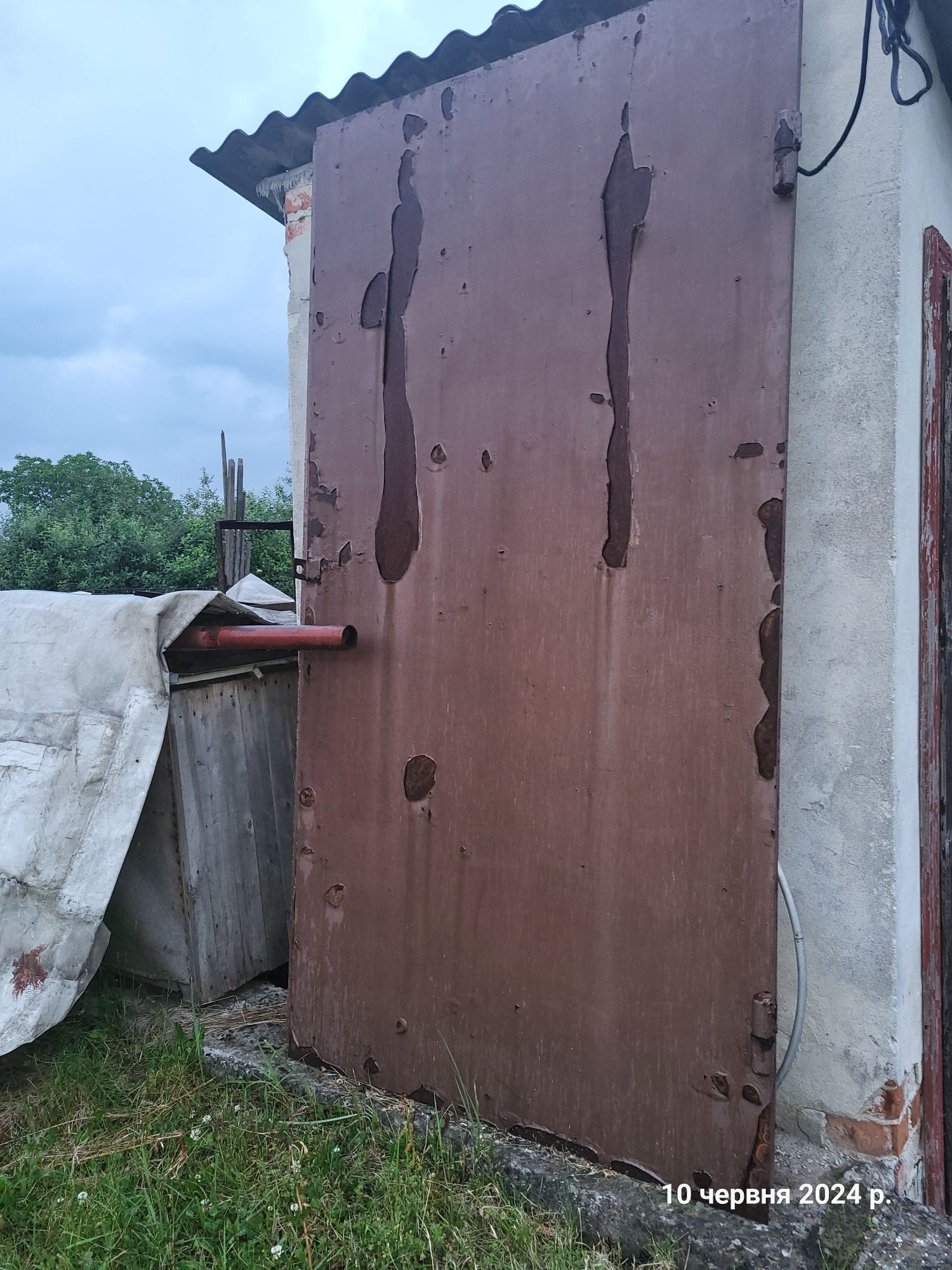 Двері ворота гараж на колодку утеплені