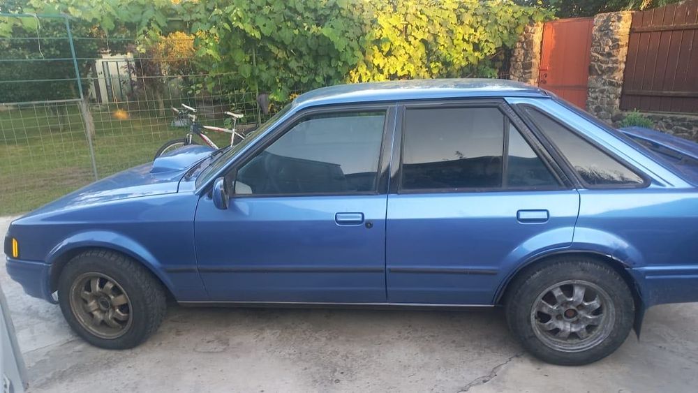 Ford escort обʼєм 1,4 л. газ/бензин, 1988р. пробіг 200000