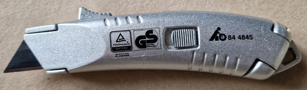 nóż metalowy automatyczny z chowanym ostrzem - Tajima