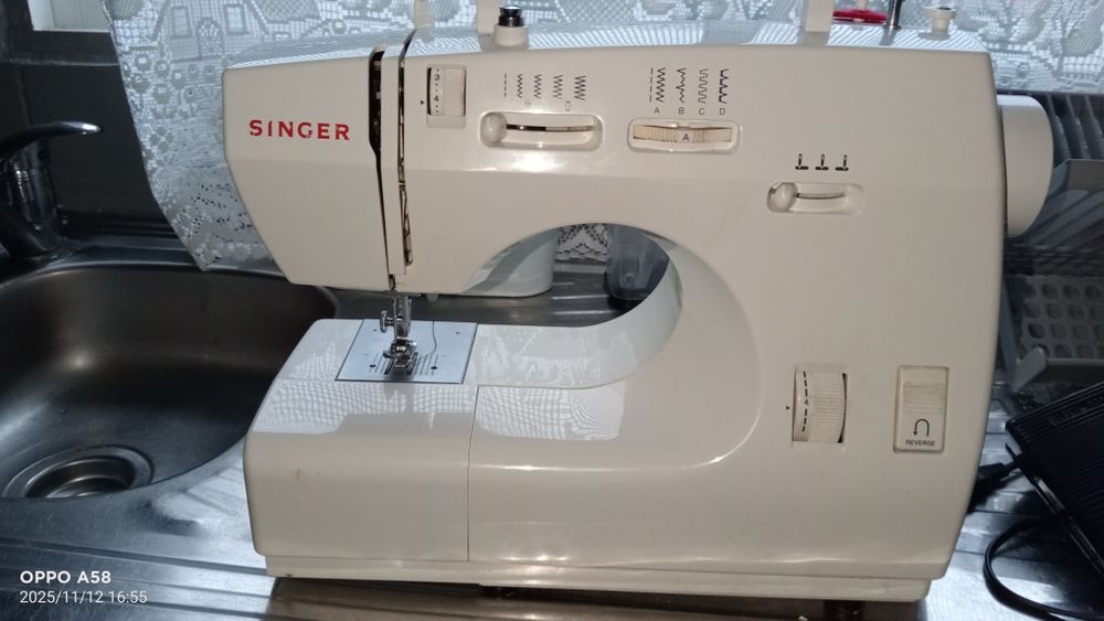 Maquina de costura Singer