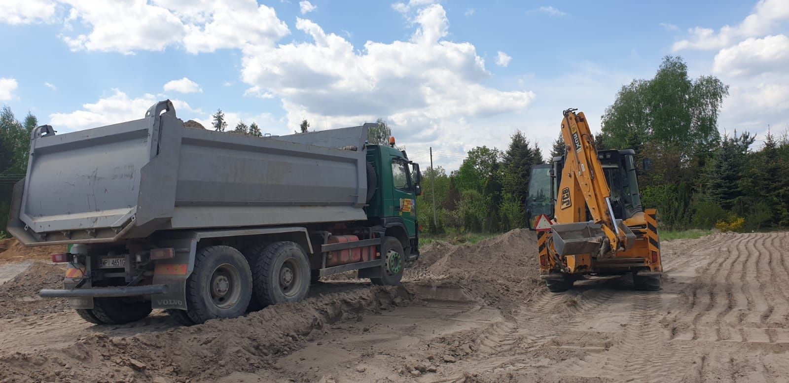 Koparko ładowarka+ transport materiałów sypkich