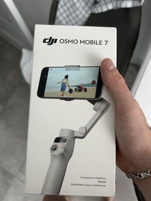 Новенький Стабілізатор відеозйомки DJI Osmo Mobile 7