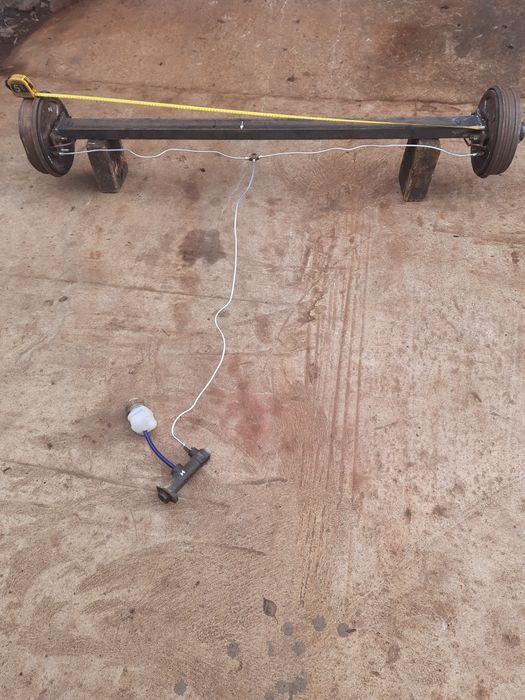 Ось для прицепа с тормозами