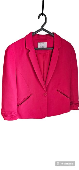 Blazer fucsia com manga arrepiada
