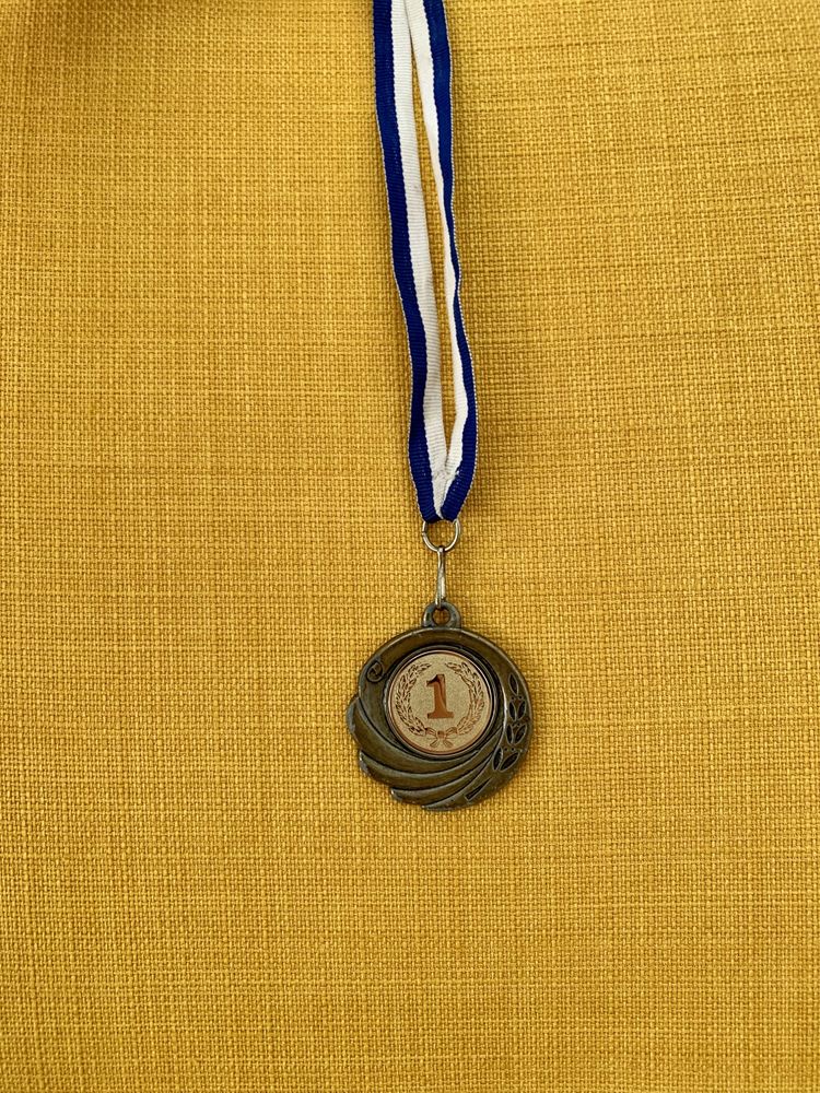 Medalha de 1.º lugar