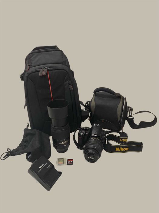 Nikon D3100 + 18-55mm + 55-300mm + Acessórios e Bolsas