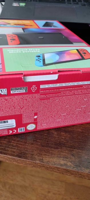 Nintendo Switch OLED + Comando [SELADA]