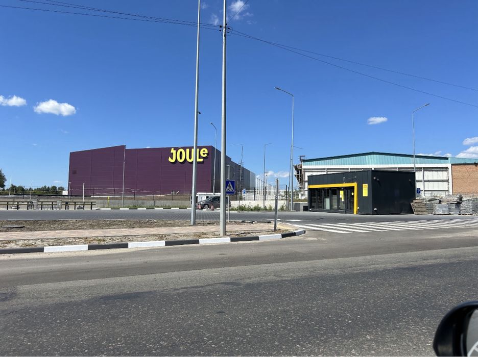 Ділянка з електрикою, асфальт. Промзона, склади.