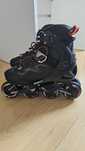Patins em linha pretos