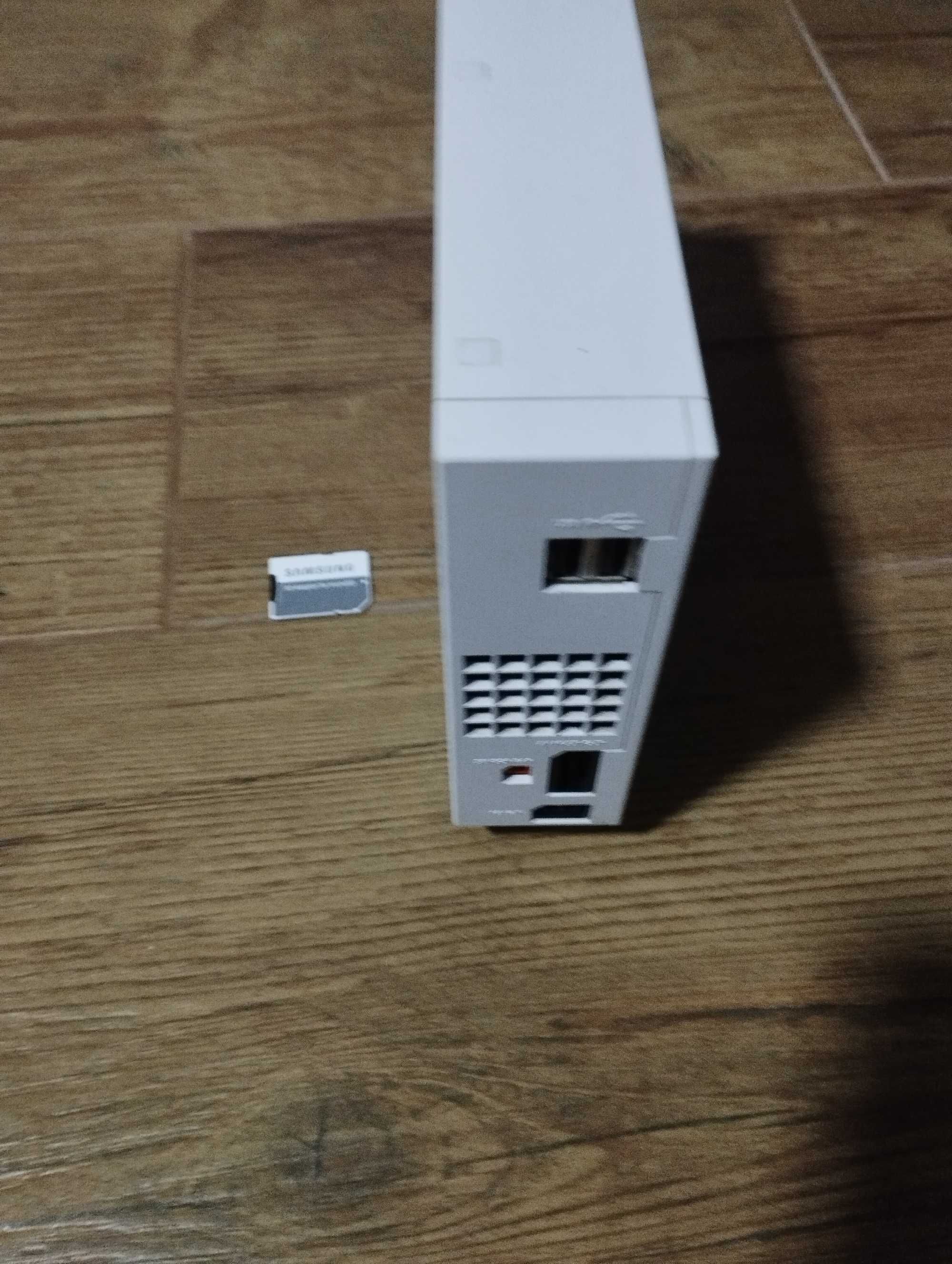 Consola Wii + Comandos + Acessórios