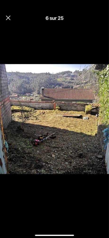 Casa com dependência e terreno