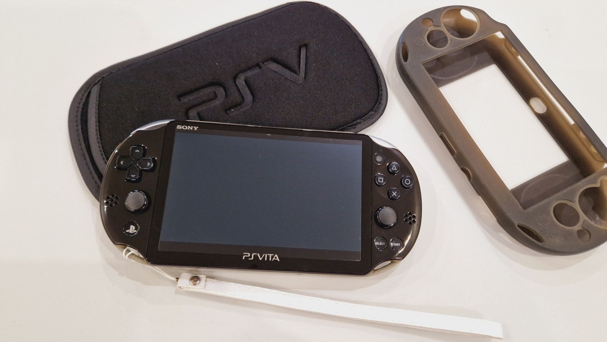 Sony Ps Vita Slim 64гиг с играми 67шт + 2 чехла!