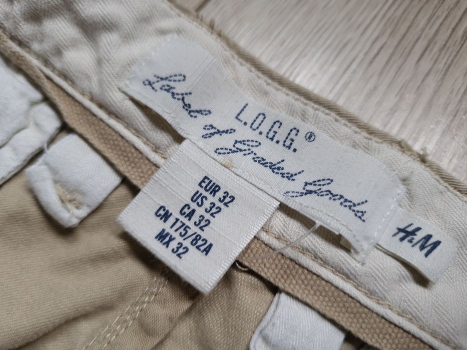 Spodnie ** HM  * Ładne , jasne , ! 32/32