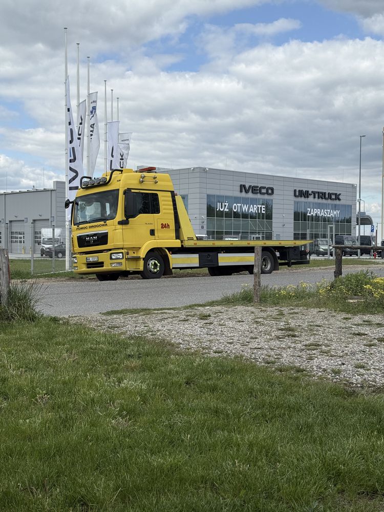 Pomoc drogowa, autolaweta, holowanie, transport aut wózków maszyn