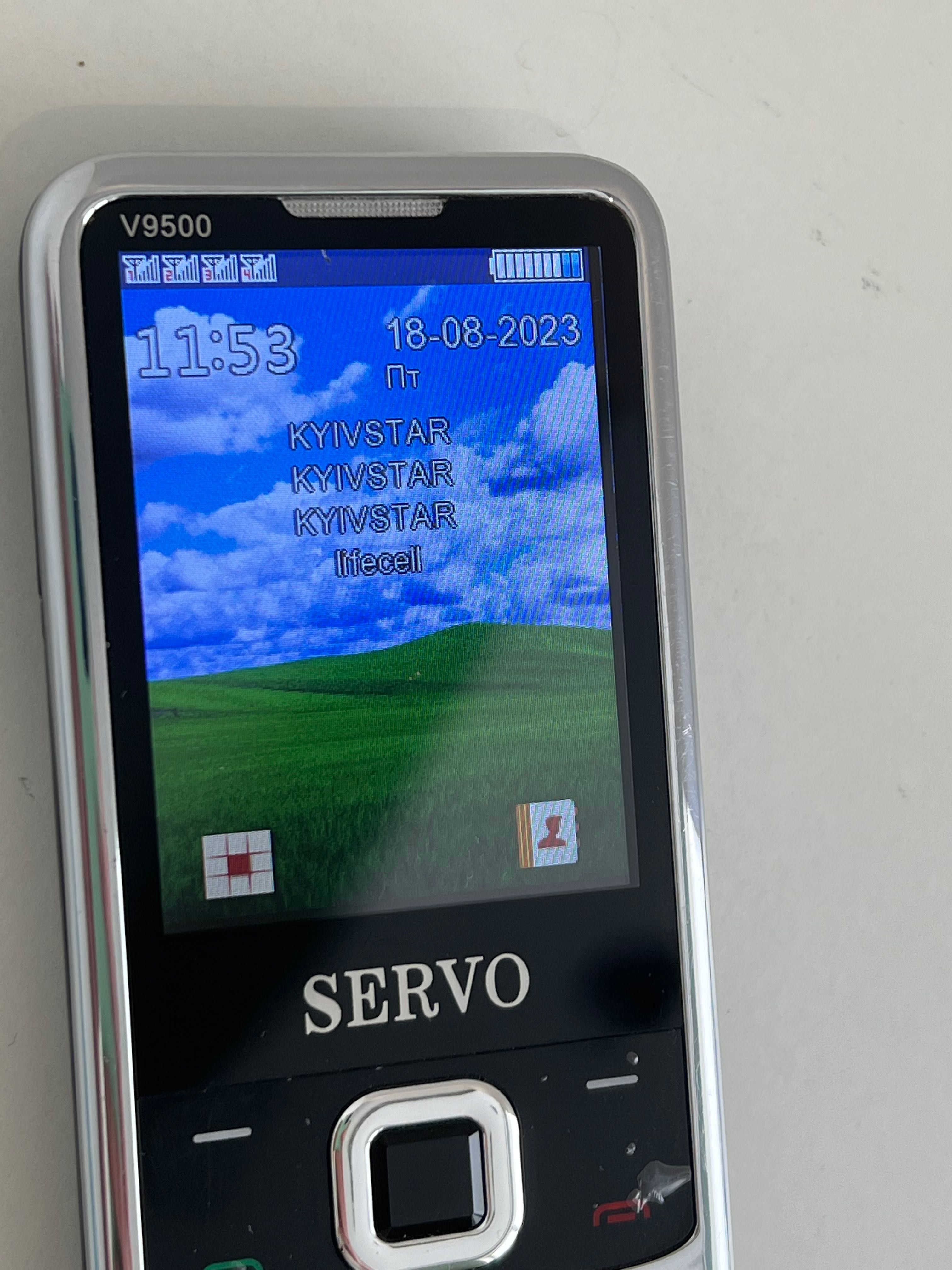 4х симний телефон Servo V9500