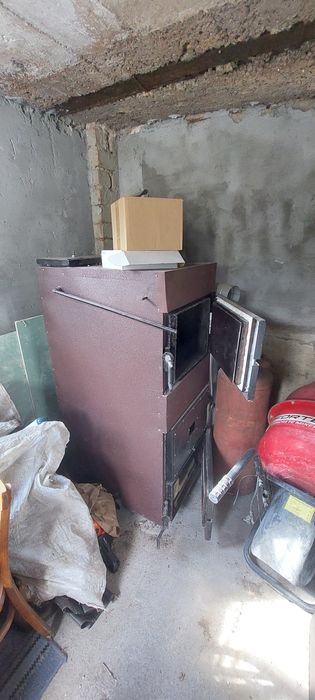 Пиролизний твердотопливный котел довгого горіння