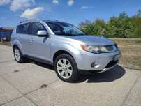 Mitsubishi Outlander OUTLANDER 4x4 2009, diesel, 140KM, srebrny