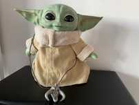Bebé Yoda brinquedo eletrónico