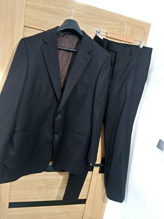 Oryginalny męski garnitur Hugo Boss roz 54 XL 100% virgin Woll czarny