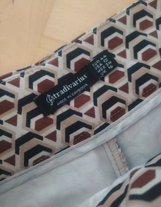 Spodnie damskie 40/L kolorowe Stradivarius brązowe beżowe