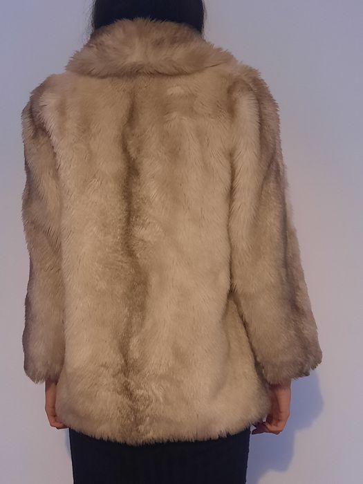 Casaco pelo branco