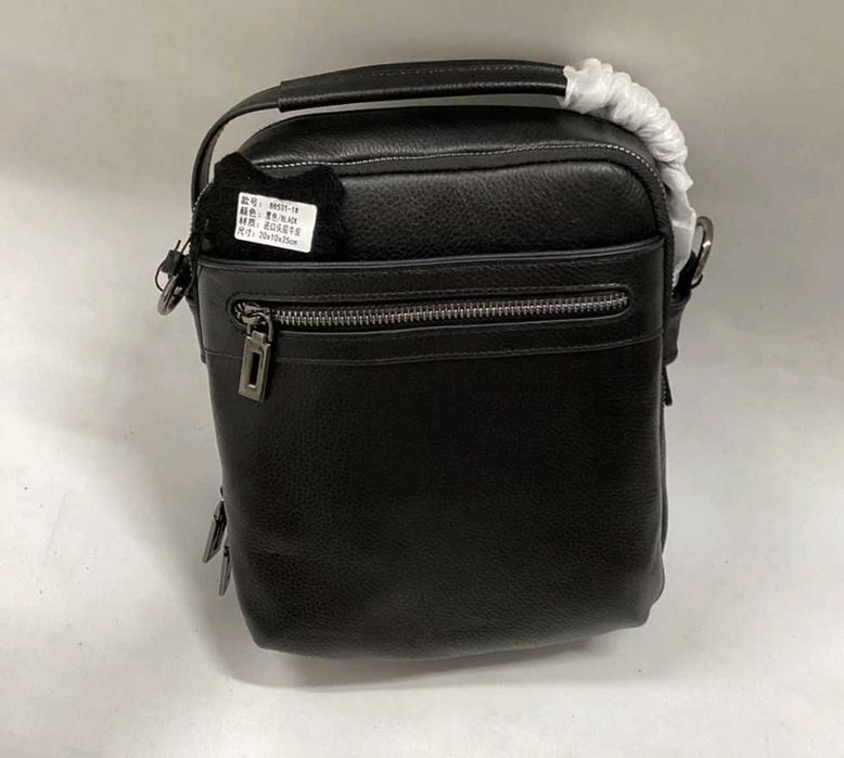 Гарна якісна шкіряна сумка чоловіча вмістка