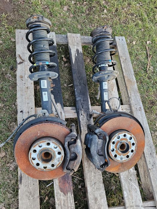 noga amortyzator Mcperson zwrotnica tarcza zacisk VW Caddy III 3 IV 4