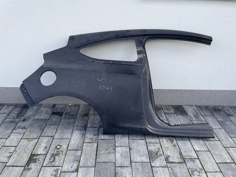 OPEL ASTRA GTC Błotnik tylny prawy