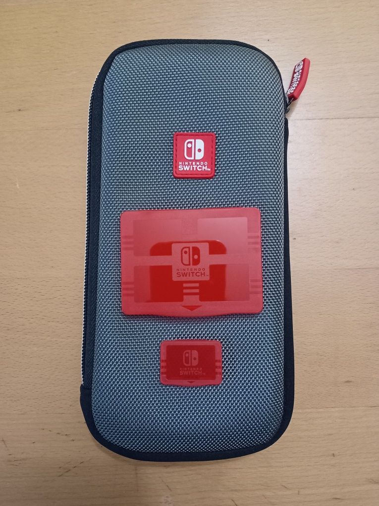 Nintendo Switch Lite + Extras