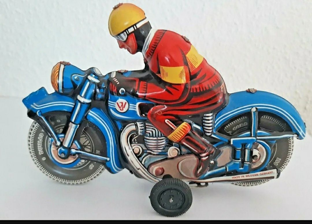 Stara zabawka blaszana nakręcana Germany Motocyklista motor PRL