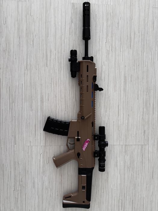 Іграшковий обріз-ган з лазерним прицілом і дальністю 30 м