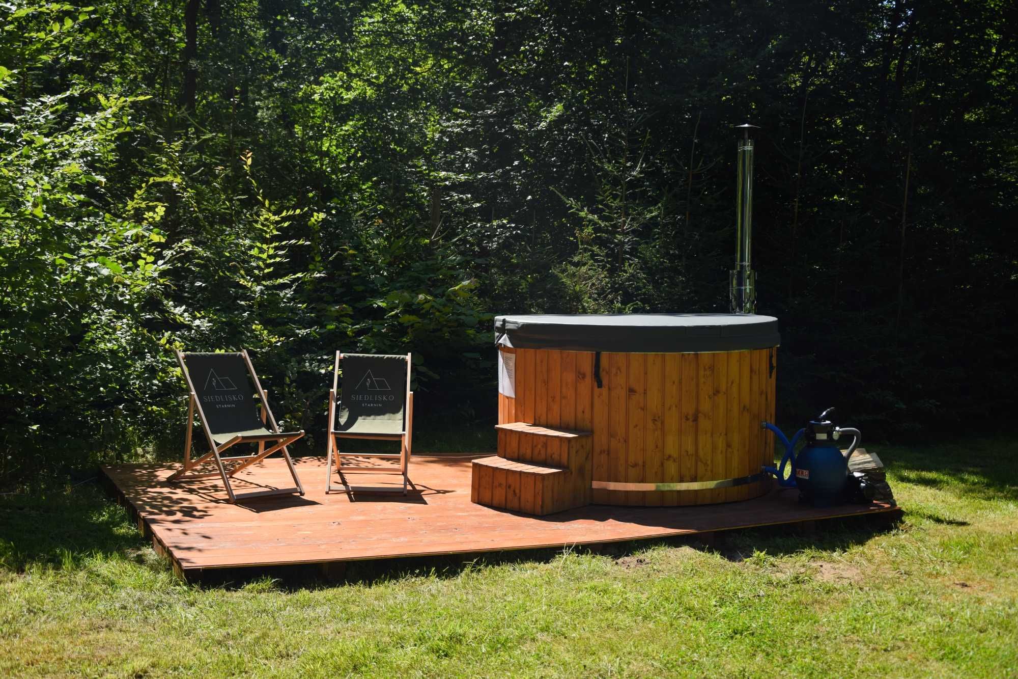 Domek nad jeziorem w lesie Starnin jacuzzi 7 min od HOSSOLANDU