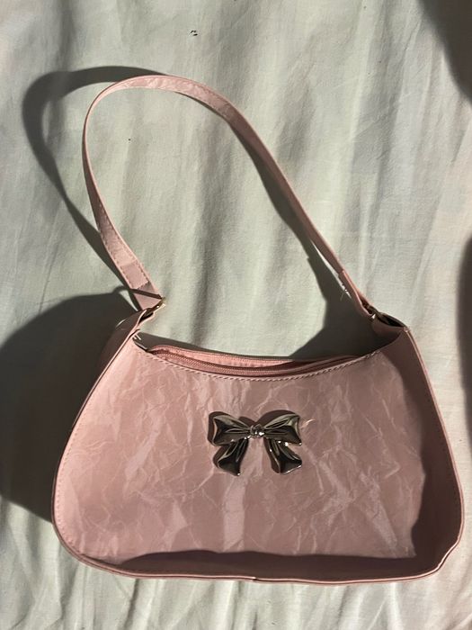 мила рожева сумка з бантиком