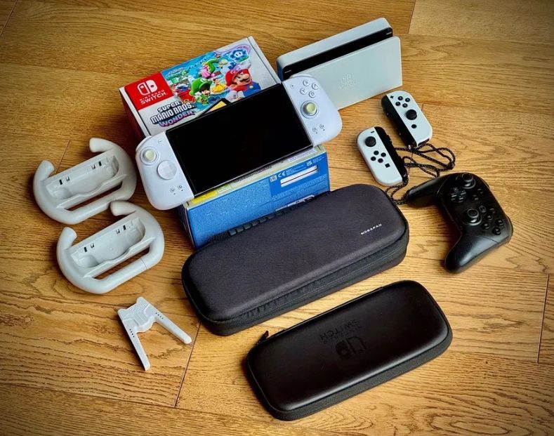 Nintendo Switch OLED+Pro Controller+Mobapad M6 HD, jak nowe, gwarancja