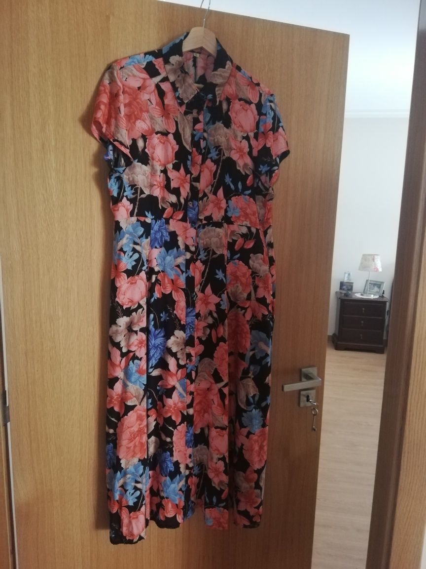 Vestido comprido com bolsos
