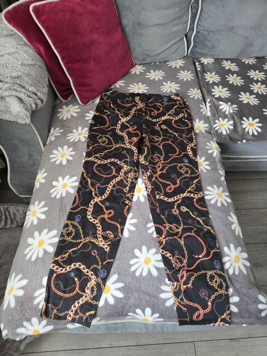 Eleganckie spodnie chinosy mohito łańcuchy 38 M