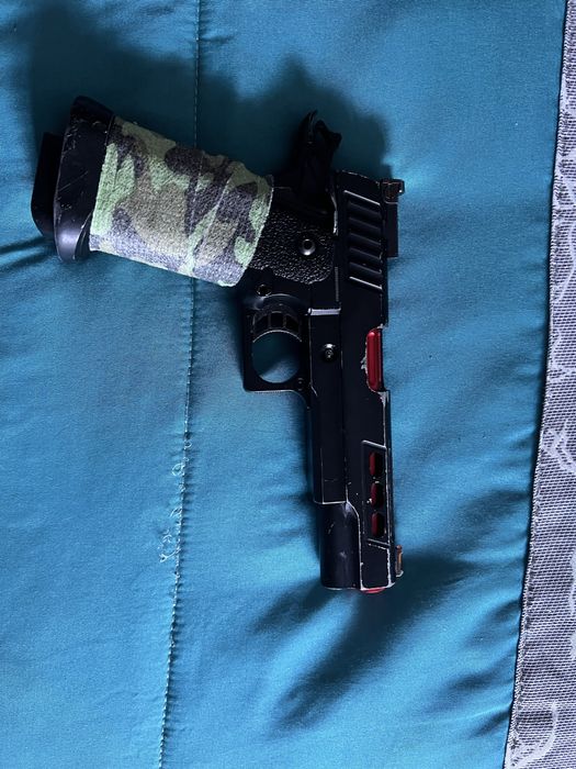 Pistola de airsoft Hi capa
